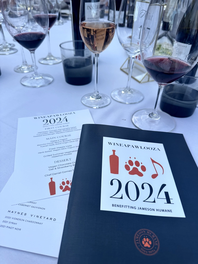 Photo of a dinner table at Jameson Humane Wineapawlooza 2024